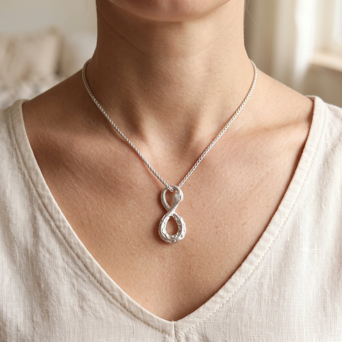 925 Sterling Silver Infinity Serpent Pendant Embodying Eternal Power