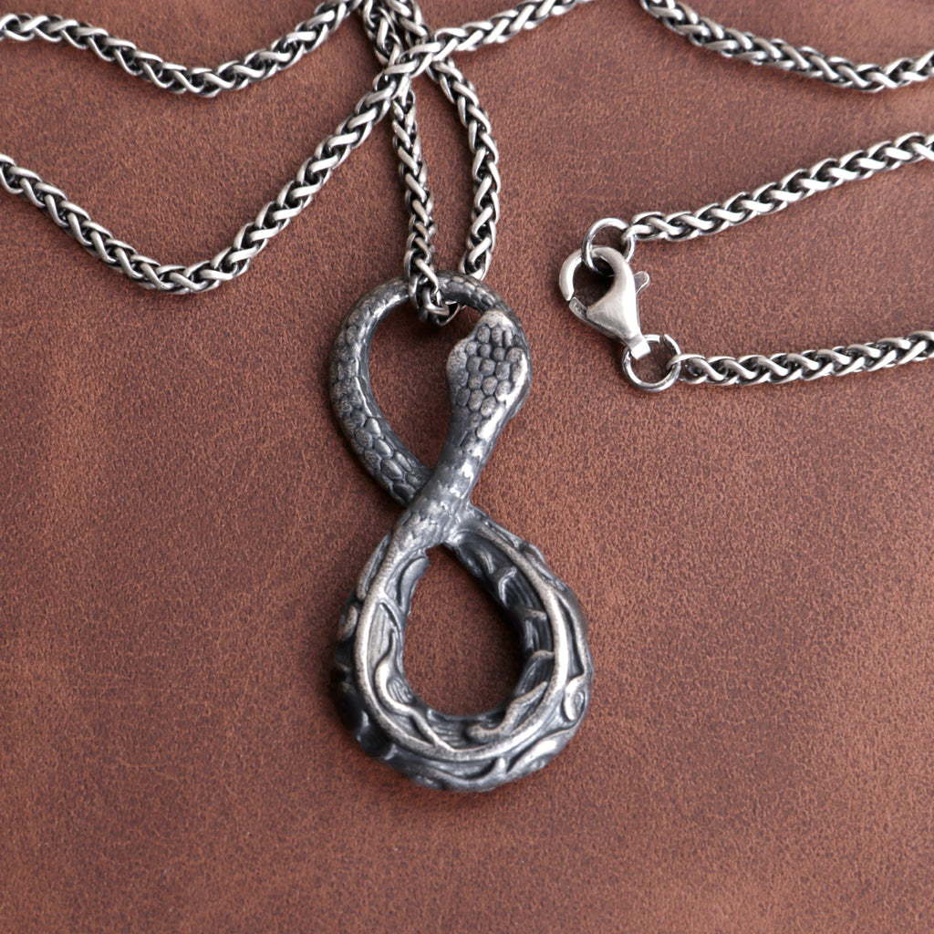 925 Sterling Silver Infinity Serpent Pendant Embodying Eternal Power