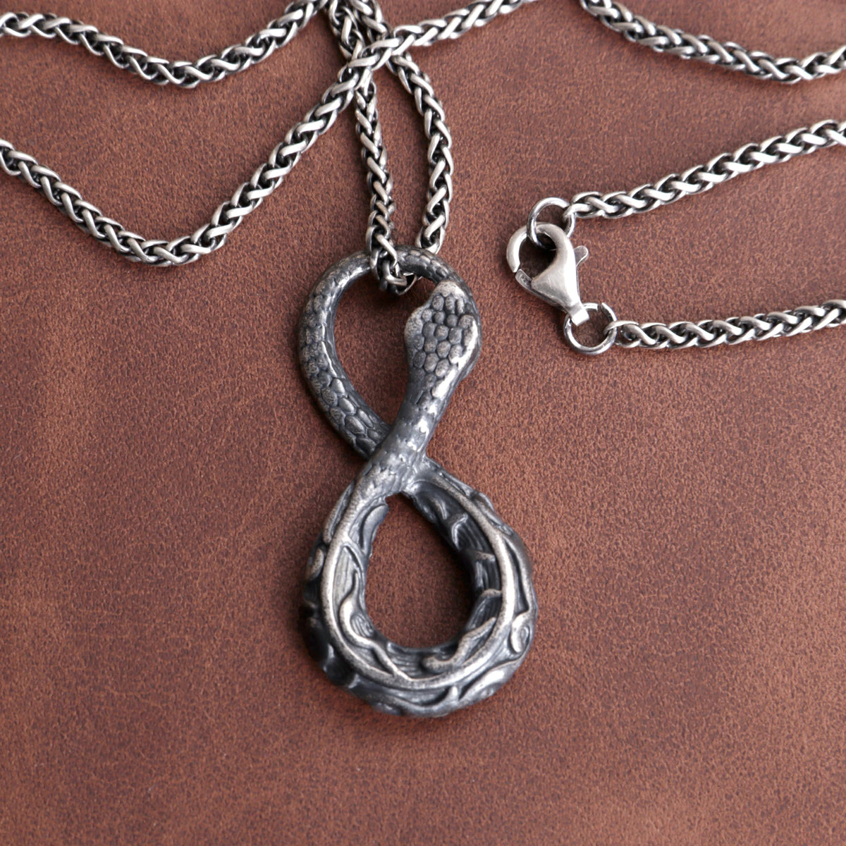 925 Sterling Silver Infinity Serpent Pendant Embodying Eternal Power