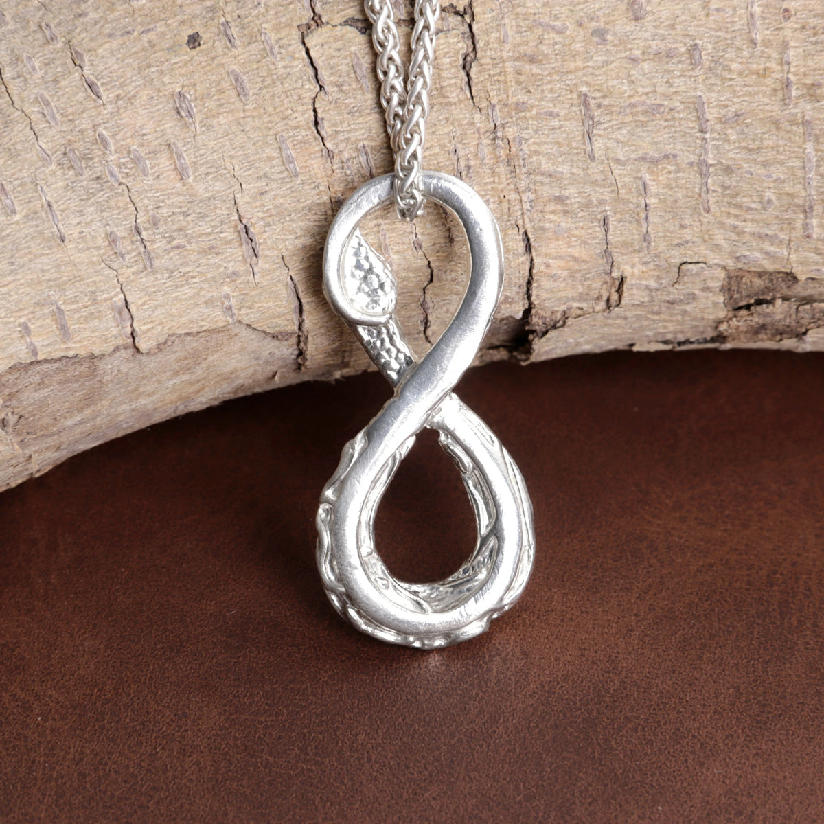 925 Sterling Silver Infinity Serpent Pendant Embodying Eternal Power